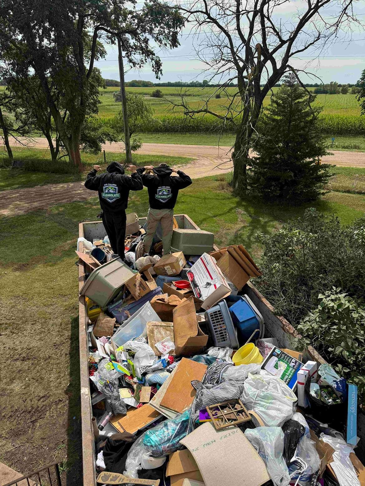 Crew sorting junk removal items